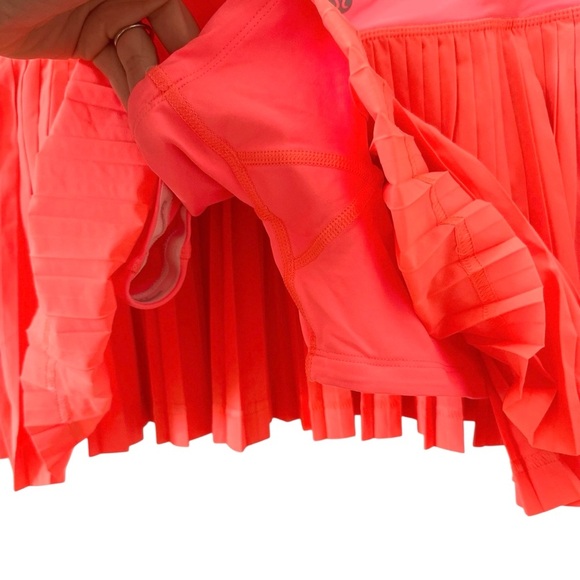 Lululemon Pleat to Street Skirt II in "Grapefruit" Neon Size 8 - Picture 11 of 14